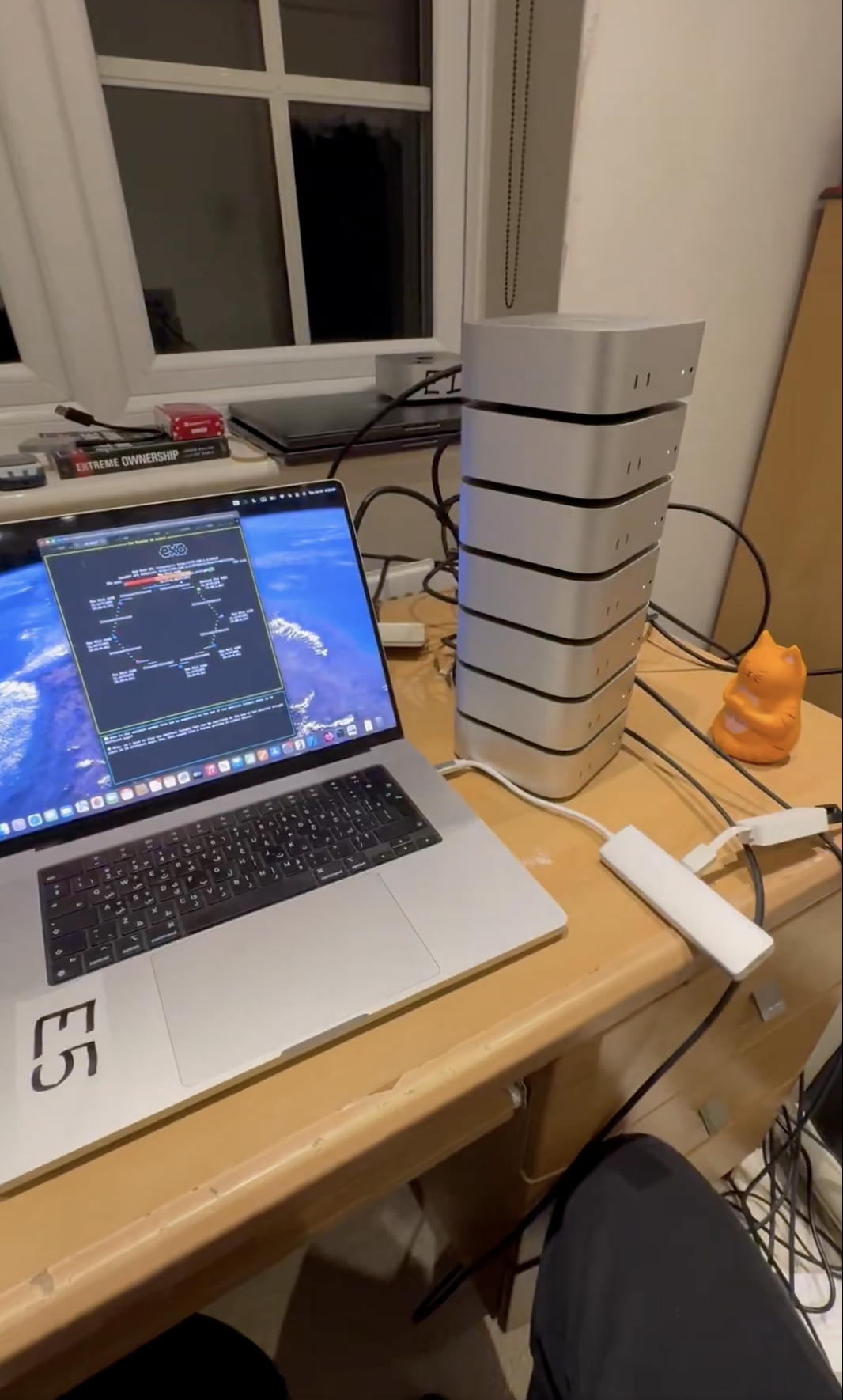 Figure 8: Alex Cheema- Running DeepSeek R1 across my 7 M4 Pro Mac Minis and 1 M4 Max MacBook Pro.